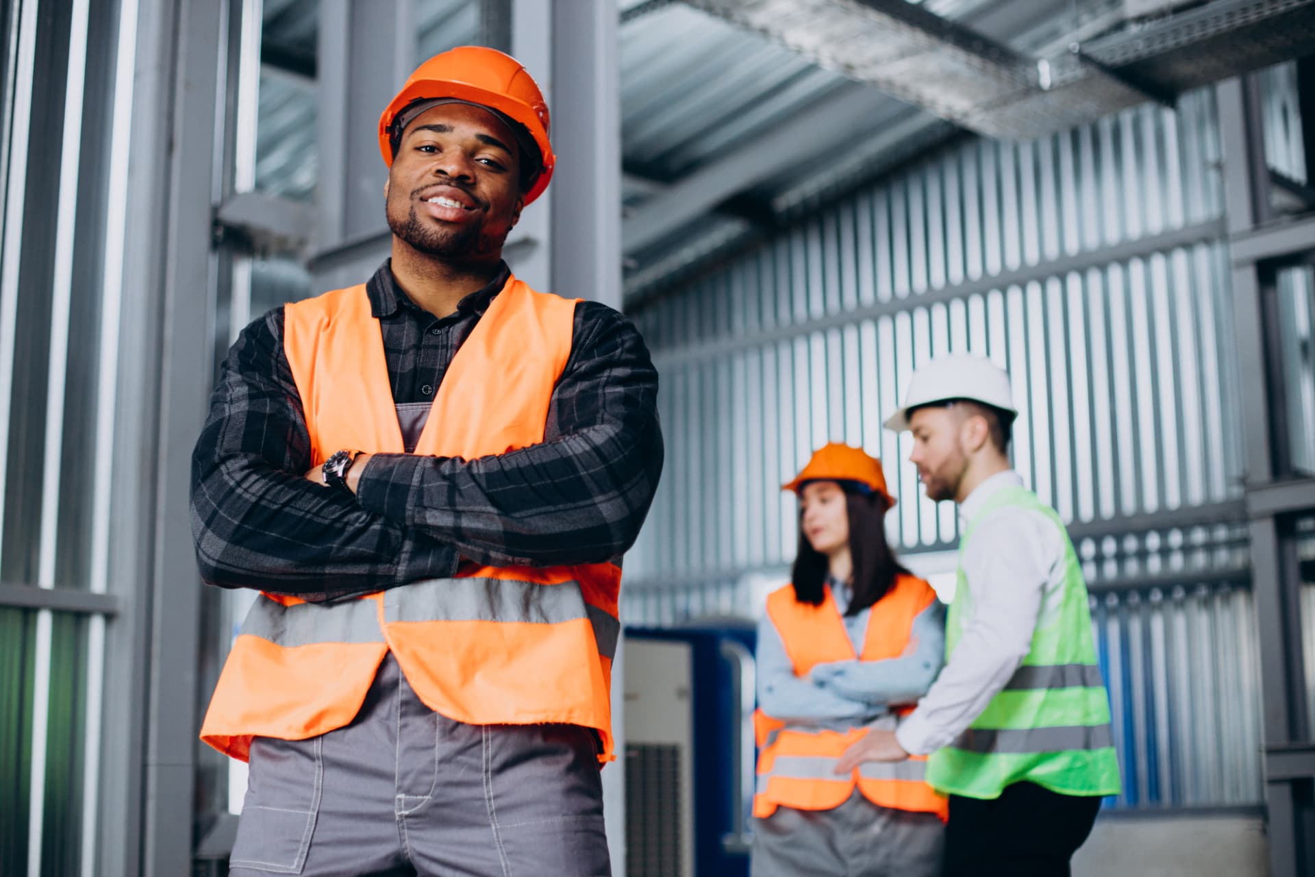 Engineer reviewing equipment specifications in a logistics warehouse